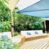 Microperforated roller shade sails on acacia wooden mats