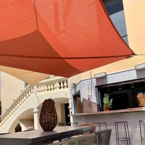 Roller shade sails for terraces
