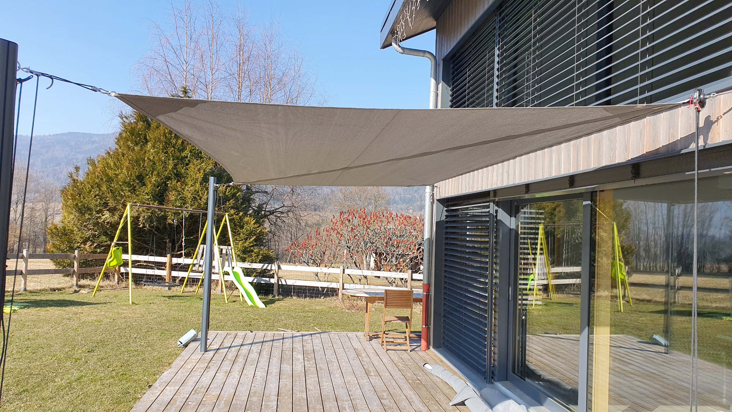 Openwork roller shade sail