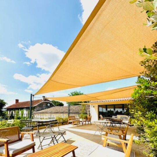 Shade sails with roller on a pole